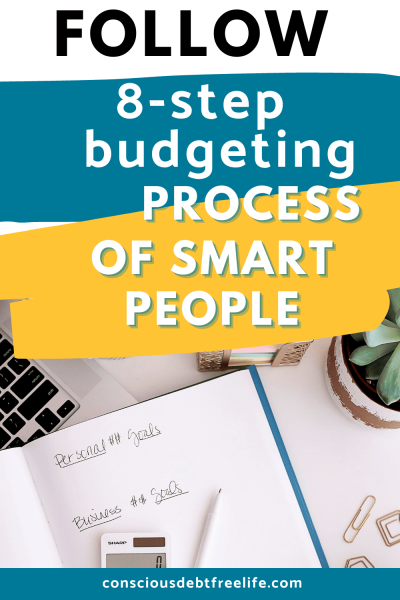 Notepad and plant with budgeting process